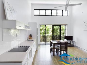 FIRST FLOOR, TWO BEDROOM APARTMENT WITH OCEAN GLIMPSES!