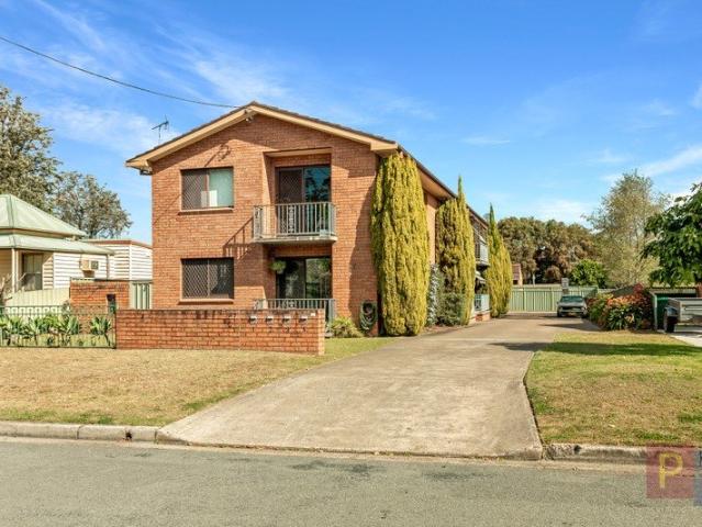 FIRST FLOOR UNIT, HOSPITAL AREA WITH GARAGE!