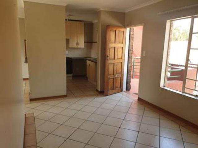 first floor unit with balcony on the.