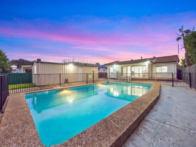 First Home with Pool, Yard & Extra Garaging