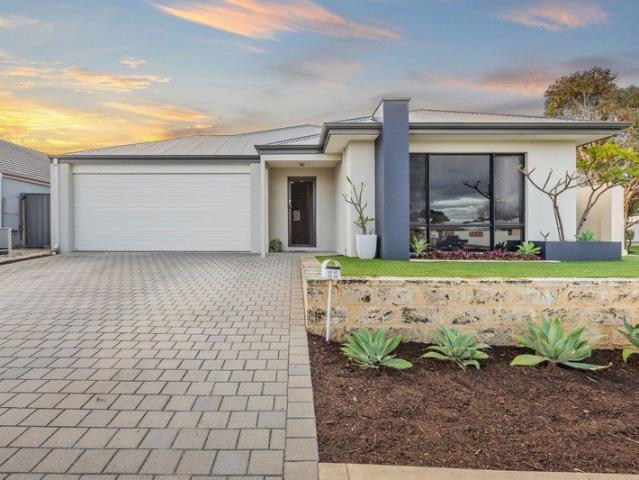 Premium family home with theatre, study and soaring high ceilings in the sought after Trinity Estate
