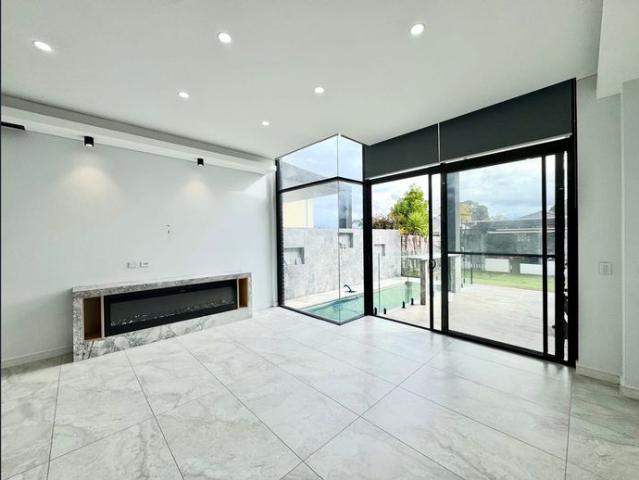 Five Bedroom Family Duplex with Pool, Multiple Living Areas & Tandem Garage