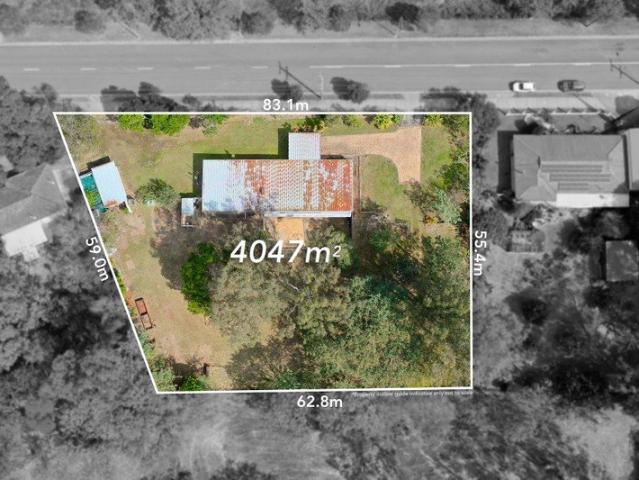 FIVE BEDROOM FAMILY HOME ON ONE ACRE OF LAND