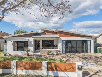 Five Bedrooms, Multiple Living Areas & Minutes to Everything