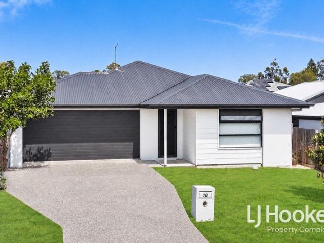 Five Bedrooms, Big Backyard & Plenty of Room to Make a Splash!