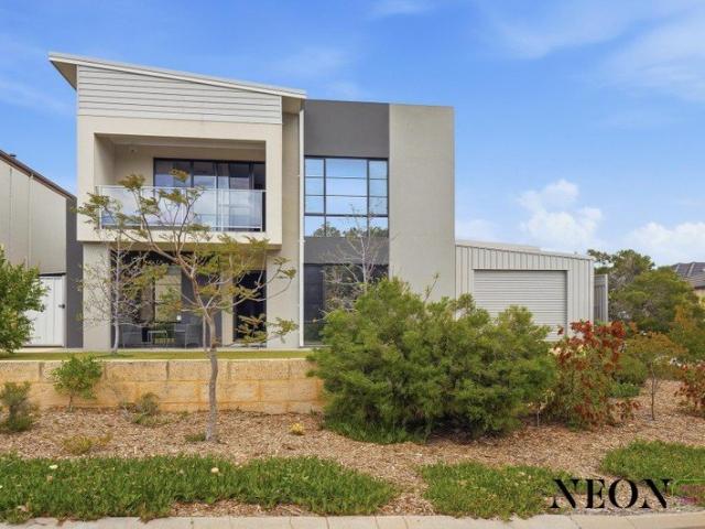 Five car garage. Sweeping ocean views. Room for just about everything!