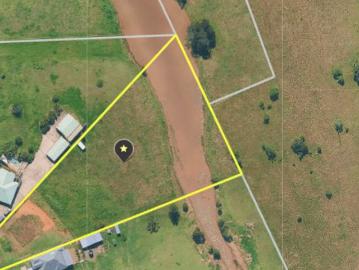FOR SALE 2.5 Acres Set in a quiet Cul De Sac Beautiful views close to shops & Schools