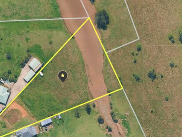FOR SALE 2.5 Acres Set in a quiet Cul De Sac Beautiful views close to shops & Schools