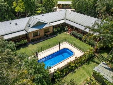 Four Acre, Dual Residence with Private Oasis, Income Potential & Landbank Opportunity