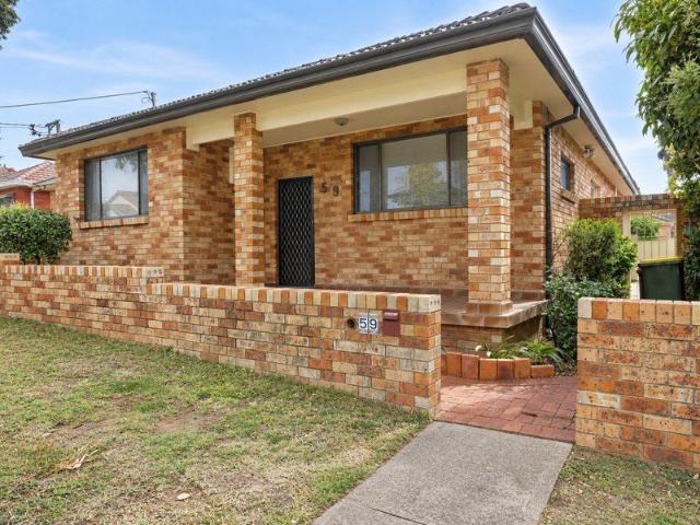 FOUR BEDROOM BRICK HOUSE !