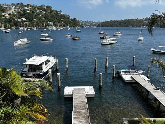 Four bedroom, deep waterfront, spectacular views, jetty & marina berth, across two titles