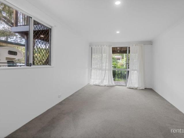 Four Bedroom Family Home with Dual Living Areas and Covered Deck
