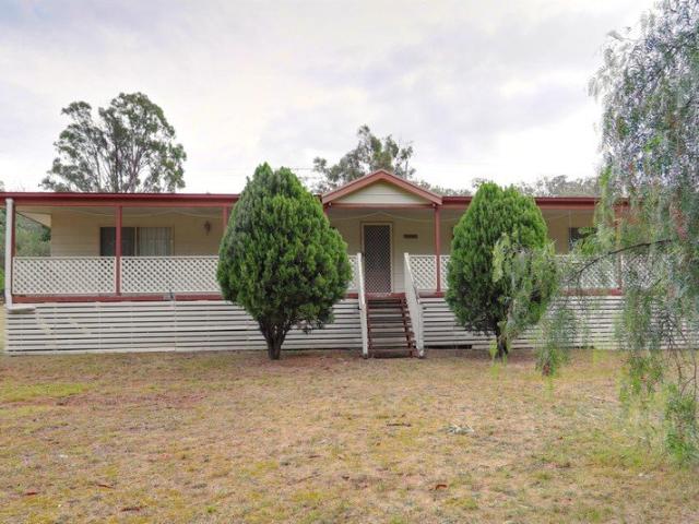 Four bedroom house on acreage