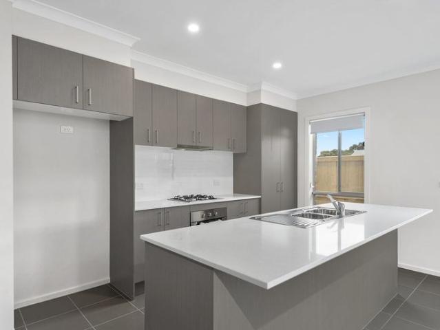 FOUR BEDROOM HOME WITH OPEN PLAN LIVING IN BERWICK WATERS