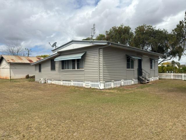 Four bedroom home with double lock up shed