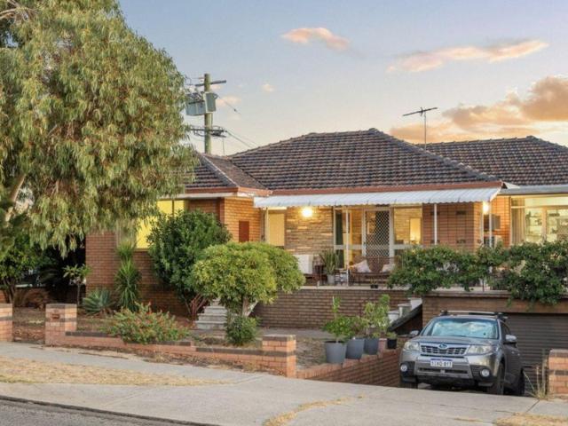 Four Bedroom Home with Excellent Parking in Convenient Location