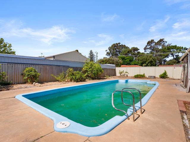 Four bedroom home with pool & multiple upgrades