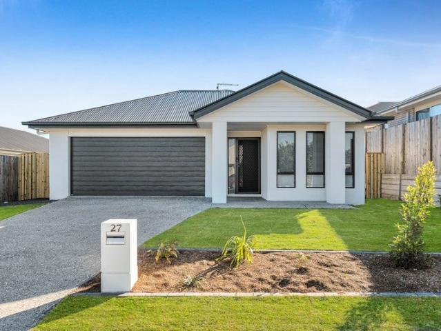 FOUR BEDROOM HOME WITH TWO LIVING AREAS