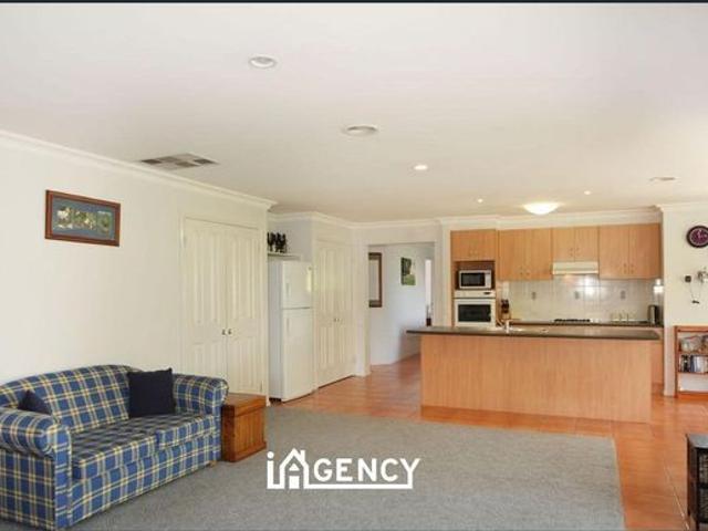 Four bedroom home with three living areas!