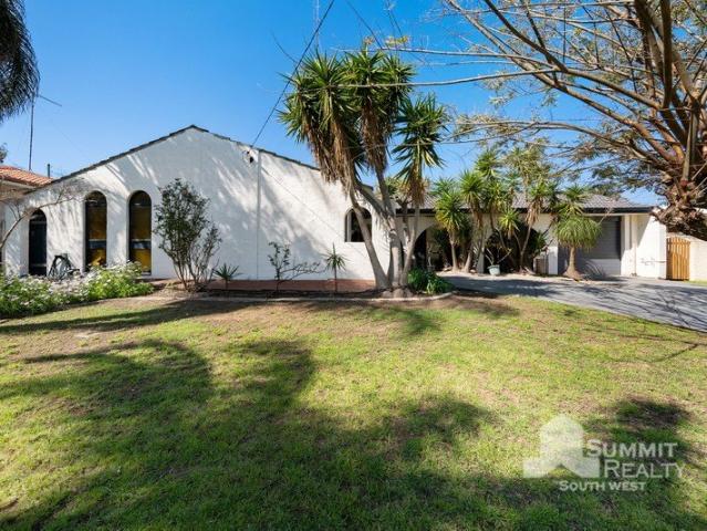 Four Bedroom Home Just Moments from the Beach