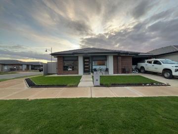 FOUR BEDROOM HOME LOW MAINTENANCE!