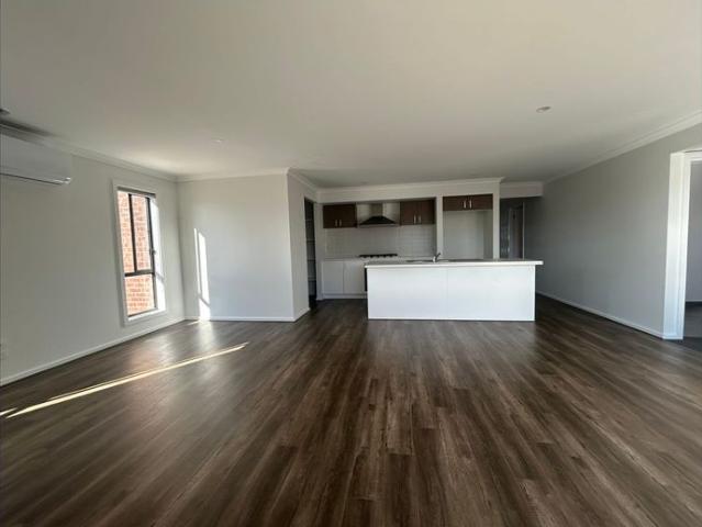 FOUR BEDROOM HOME LOW MAINTENANCE!