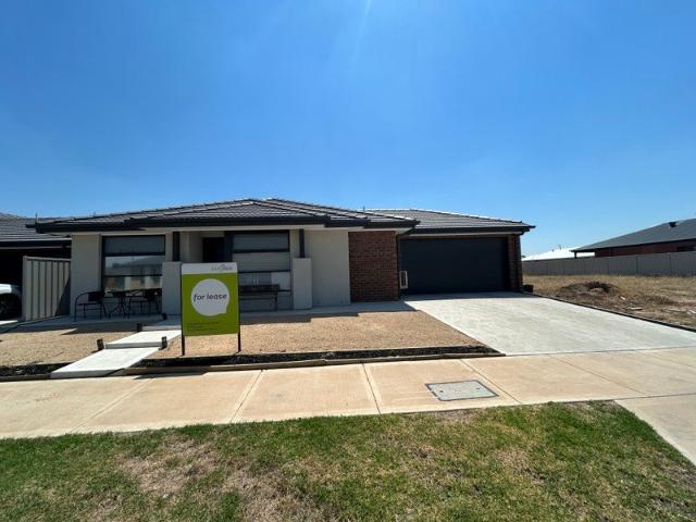FOUR BEDROOM HOME LOW MAINTENANCE!