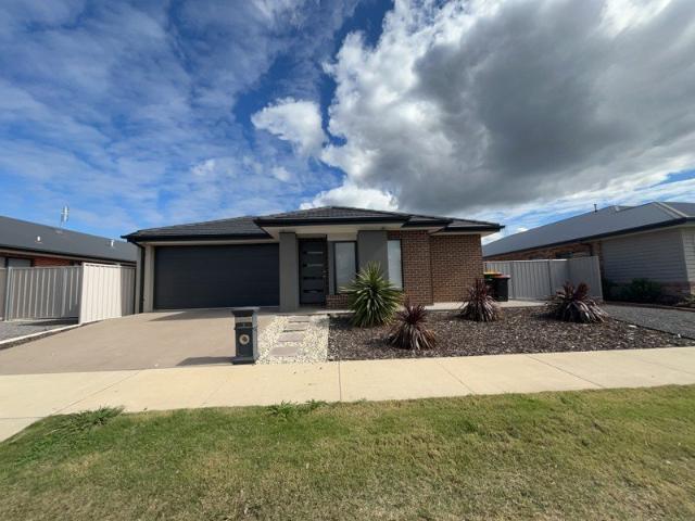 FOUR BEDROOM HOME LOW MAINTENANCE !