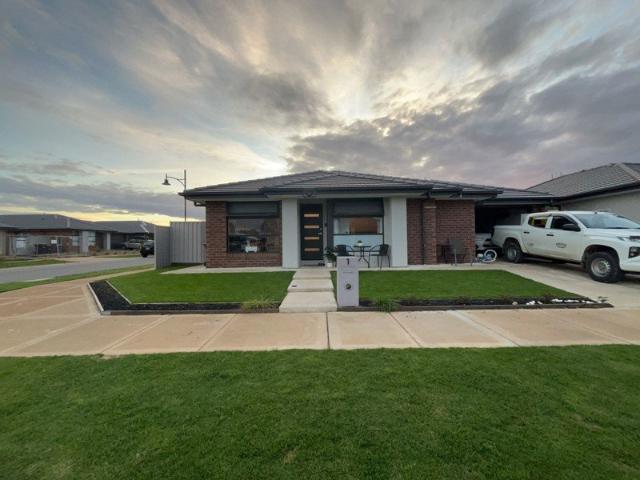 FOUR BEDROOM HOME LOW MAINTENANCE!