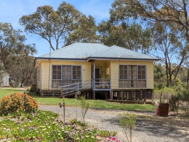 Four Bedroom on 3/4 of an acre with potential