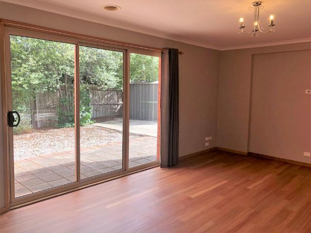 FOUR BEDROOM, THREE LIVING FAMILY HOME