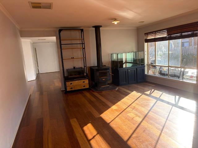 FOUR BEDROOM, TWO LIVING FAMILY HOME