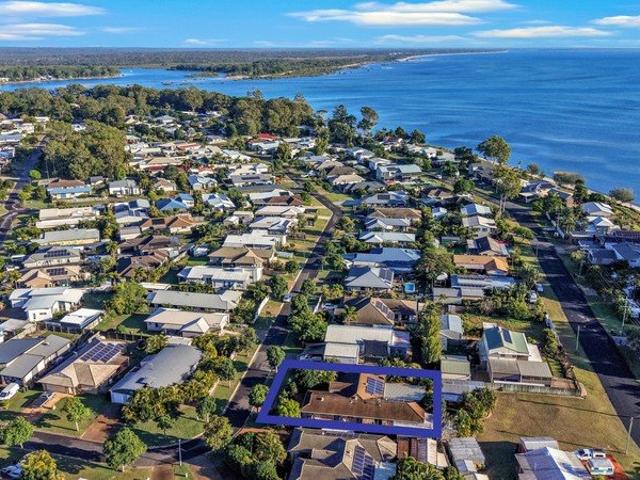 Four Bedrooms, Multiple Living Areas & A Short Stroll To The Beach!