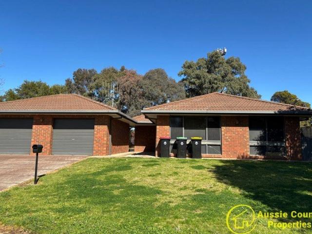 Four bedrooms, Two bathroom Two Living rooms plus 2 garage spaces
