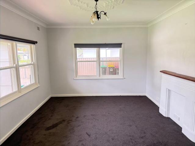 Four Bedrooms, Two Kitchens & Endless Possibilities!