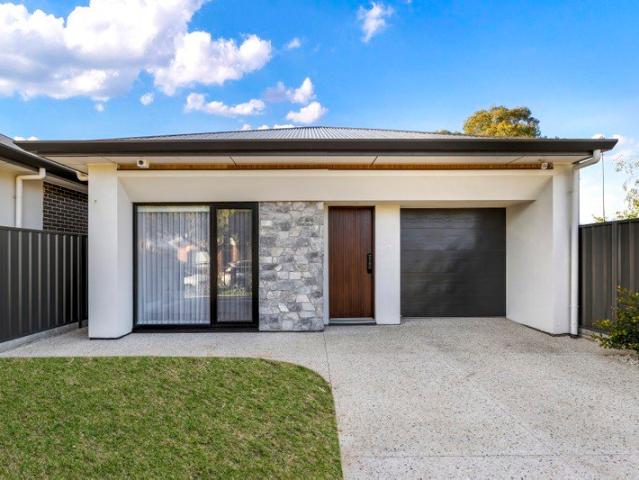Four Bedrooms, Two Living Zones & One Striking Family Haven