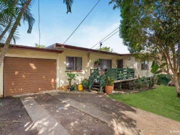 FOUR BEDROOMS | TWO LIVING ZONES | PRIVATE BACKYARD
