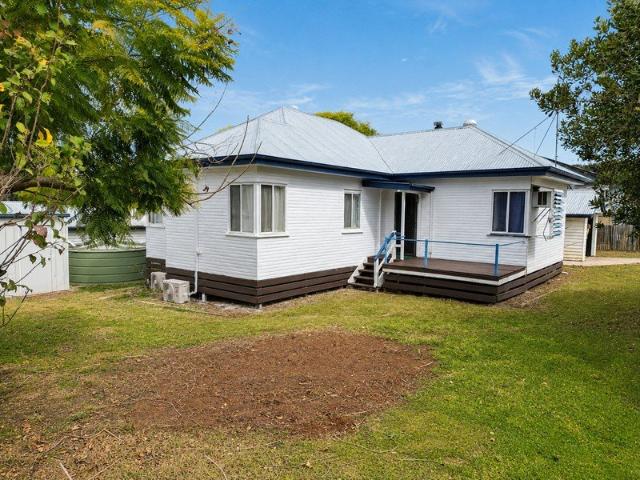 Four Bedrooms, Versatile Spaces & Established Rental Opportunity