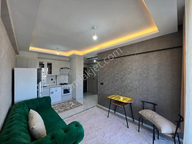 Four Land'den 450 Evlerde 1+1 Eşyalı Satılık Daire