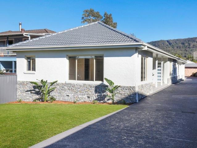 Four Renovated Units | One Exceptional Investment