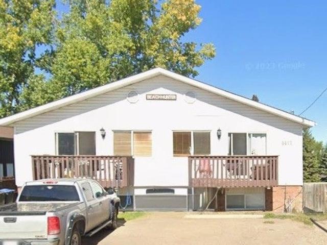 Fourplex Unit Located in Sylvan Lake!