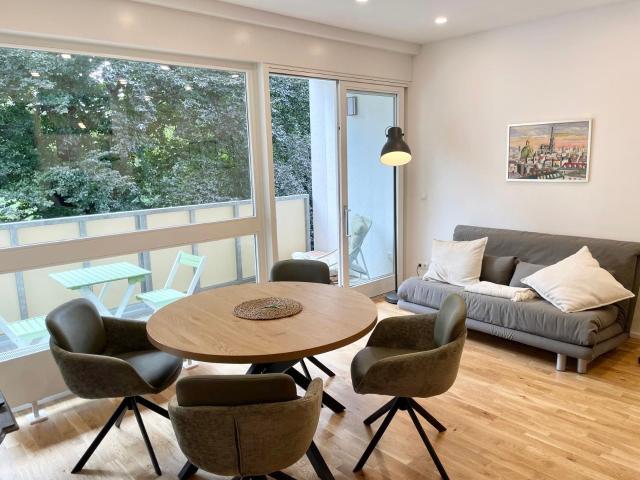 Flat with balcony and AC with garden view
