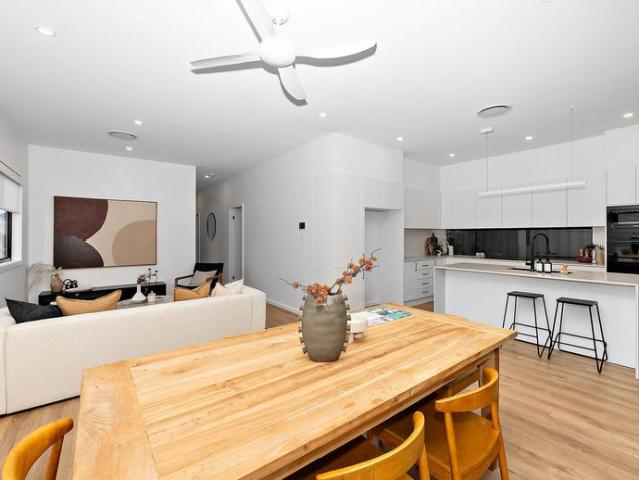 FLAWLESS DESIGN, DUCTED COMFORT & ENTERTAINER’S DECK IN A PREMIUM FAMILY LOCATION