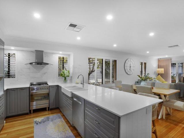 FLAWLESS SPLIT LEVEL ENTERTAINER WILL INSTANTLY WIN YOUR HEART