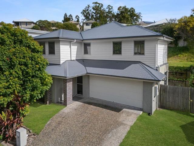 Flexible Family Living with Downstairs Master & Elevated Outlook