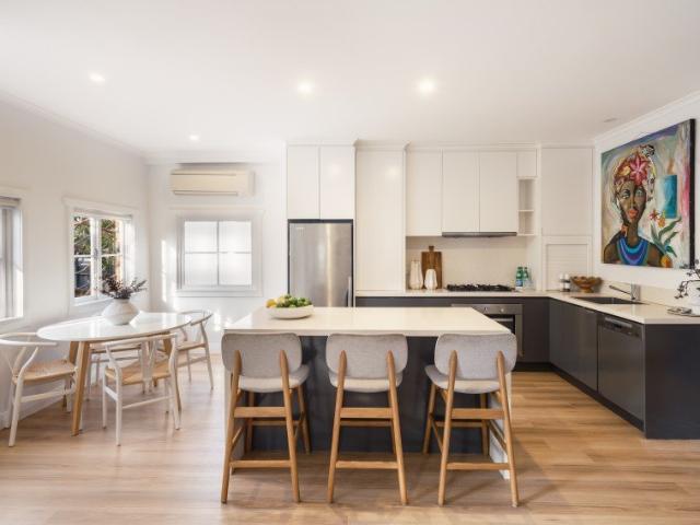 Flexible family living with luxe coastal finishes, easycare lawns and a prized central location