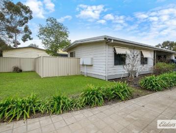 Front Unit. Low Maintenance Living. Solid Opportunity