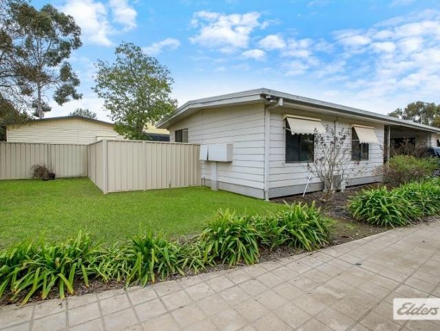 Front Unit. Low Maintenance Living. Solid Opportunity