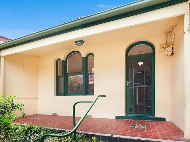 Single level home with rear lane access