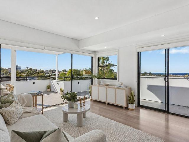 Freestanding sun soaked home basks in ocean views